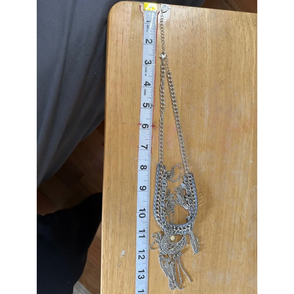 Claires Silver Tone Boho Crescent Moon Fringe Statement Bib Necklace Filigree